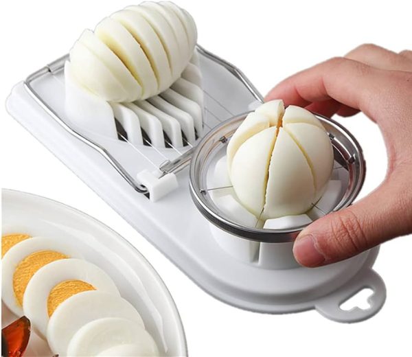 Egg slicer with stainless steel wires and a plastic base, used for slicing hard-boiled eggs into even, uniform pieces in Lagos Nigeria