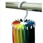 Multipurpose hanger designed to organize scarves, belts, and ties neatly in closets, featuring multiple hooks or loops for space-saving storage in Lagos Nigeria