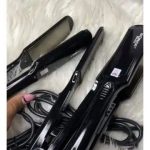 Salon professional hair straightener and curler 2-in-1 styling tool with ceramic plates, designed for smooth straightening and creating curls or waves in Lagos Nigeria