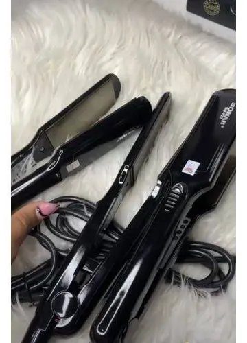 Salon professional hair straightener and curler 2-in-1 styling tool with ceramic plates, designed for smooth straightening and creating curls or waves in Lagos Nigeria