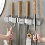 Wall-mounted mop organizer holder—space-saving storage rack for mops, brooms, and cleaning tools in Lagos Nigeria