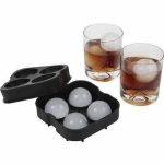 Flexible silicone ice cube tray mold with lid, makes 4 perfect round ice spheres, ideal for chilling whiskey, cocktails, and beverages in Lagos Nigeria
