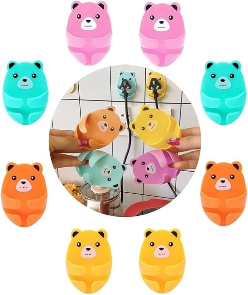 Set of 4 adhesive bear-shaped plug wire holders to organize and secure cables on walls or desks in Lagos Nigeria