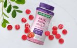Bottle of Nature Care Hair, Skin & Nails Gummies with 80 count, featuring biotin and essential vitamins in Lagos Nigeria