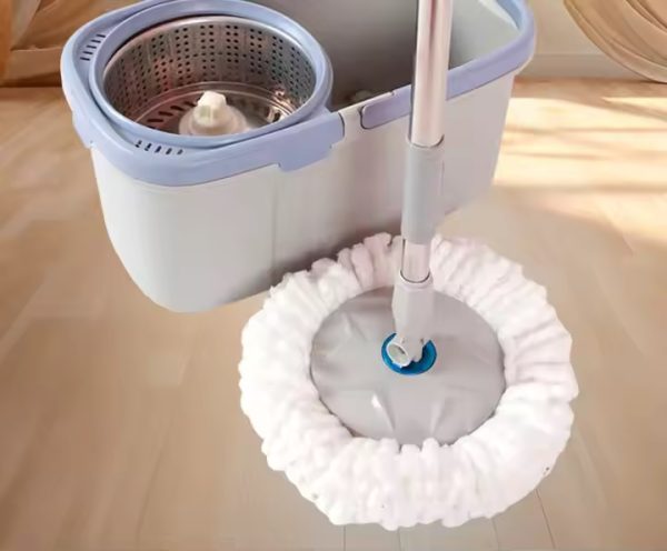 360-degree rotating spin mop with bucket and 2 white microfiber mop heads for easy floor cleaning in Lagos Nigeria