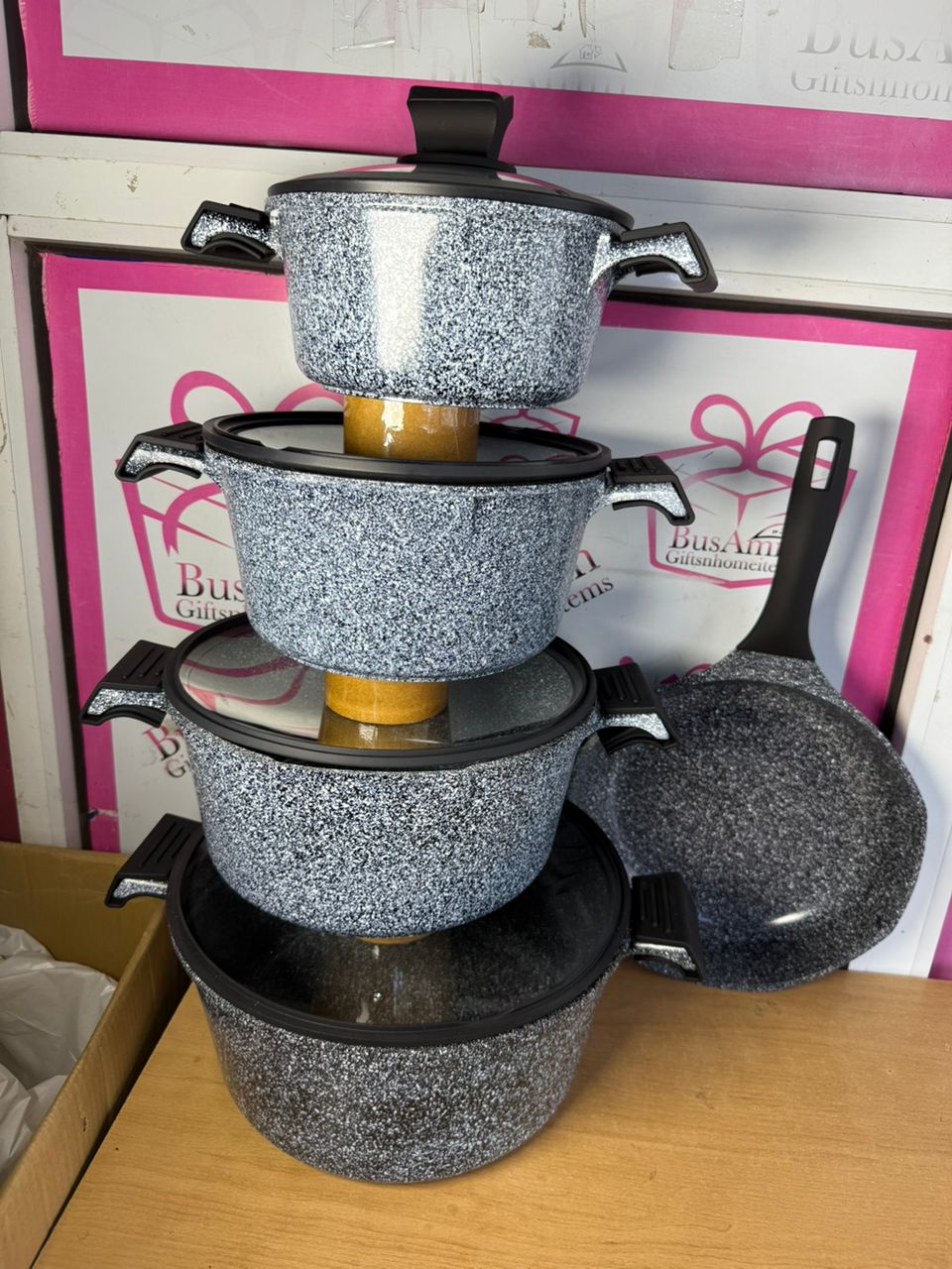 Granite cook ware in Lagos Nigeria Set of granite-coated nonstick cookware including pots and pans with glass lids and heat-resistant handles, ideal for various cooking surfaces in Lagos Nigeria